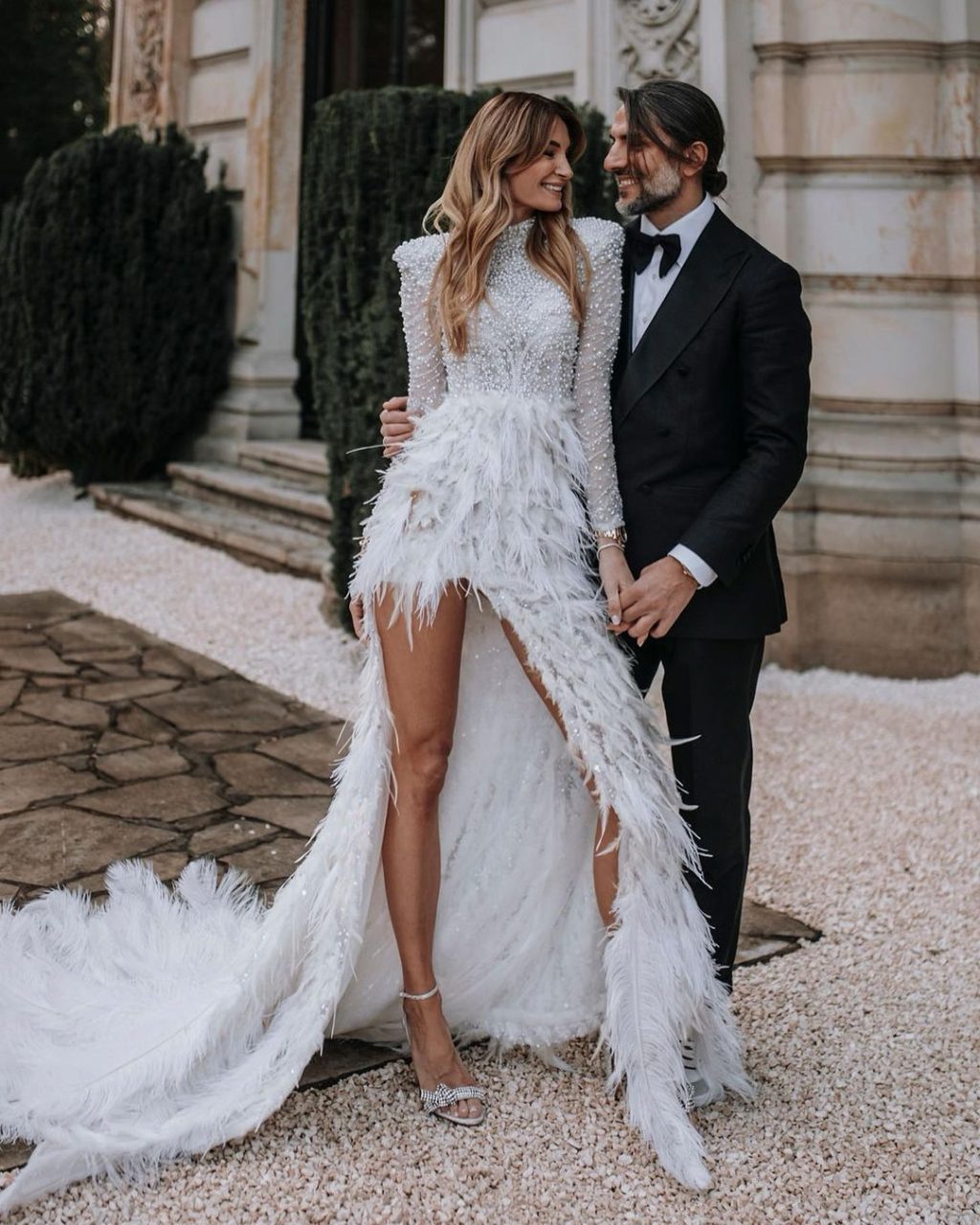 High Neck White Pearl Dress with Feathered Skirt